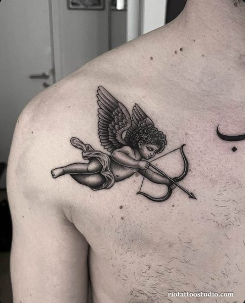Realistic cherub angel tattoo with bow and arrow on shoulder, detailed cute angel tattoo
