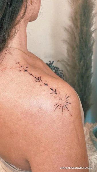 Fineline moon starburst floral dotted rays on shoulder, ethereal fineline tattoo