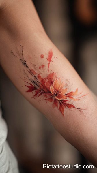 Red poppy flower with black abstract background on forearm, feminine tattoo flowers