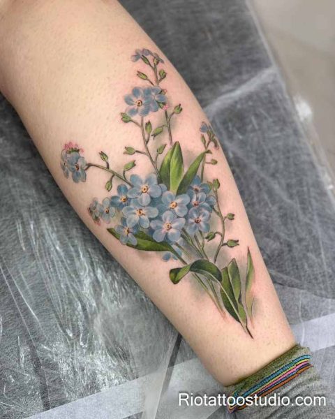 Minimal line art daisy flower with bee on forearm, feminine simple tattoo