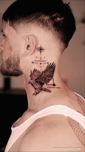 Guy neck tattoo: detailed eagle with geometric compass, “Memento Mori” and “Koinophobia” on neck, bold men’s eagle tattoo
