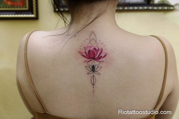 Pink lotus mandala tattoo with geometric details on upper back, sacred lotus tattoo