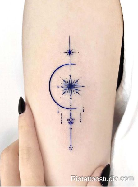 Smallest tattoos: geometric moon phases inside sacred circle on forearm, minimalist tattoo