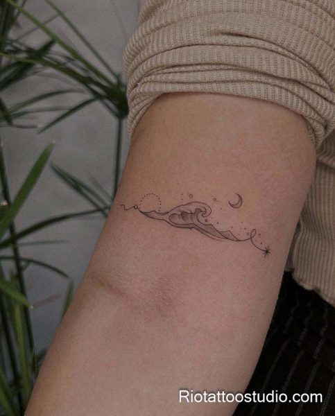 Smallest tattoos: nature-inspired wave moon stars line art on wrist, tiny tattoo design