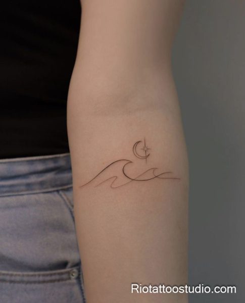 Smallest tattoos: nature-inspired wave moon stars dotted line on forearm, micro tattoo