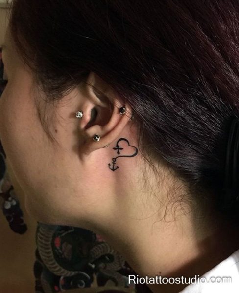 Smallest tattoos: heart and anchor line art behind the ear, behind-the-ear tattoo