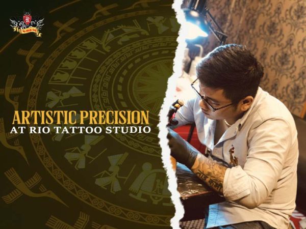 Rio Tattoo Studio artist precision tattooing snake design on arm, professional snake tattoo