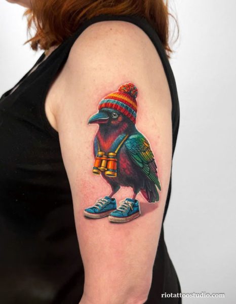 Funny colorful crow tattoo wearing beanie and sneakers with binoculars, cartoon crow tattoo ideas
