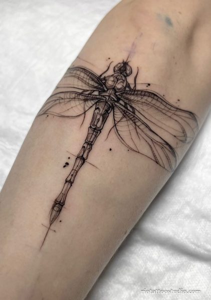 Fineline dragonfly leaves script forearm tattoo "Nem toda dor é constante", meaningful dragonfly tattoo