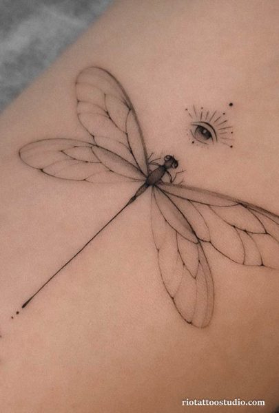 Fineline dragonfly eye motif dotted accents arm tattoo, artistic dragonfly tattoo