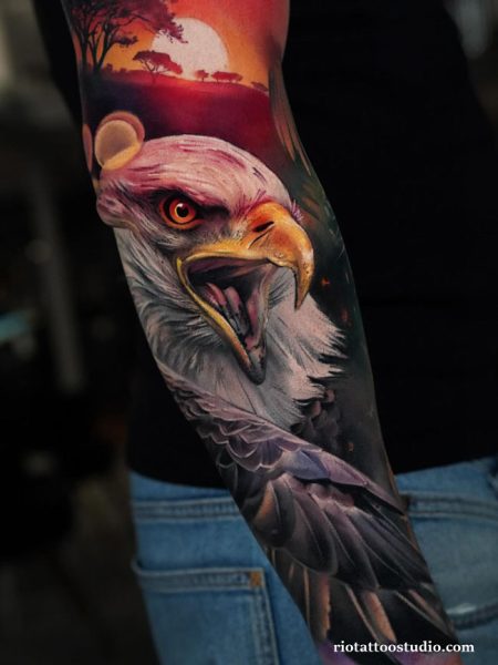 Meaning of eagle tattoo and the delicate specialty of fineline tattoos.