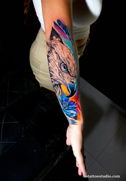 Meaning of eagle tattoo and the delicate specialty of fineline tattoos.
