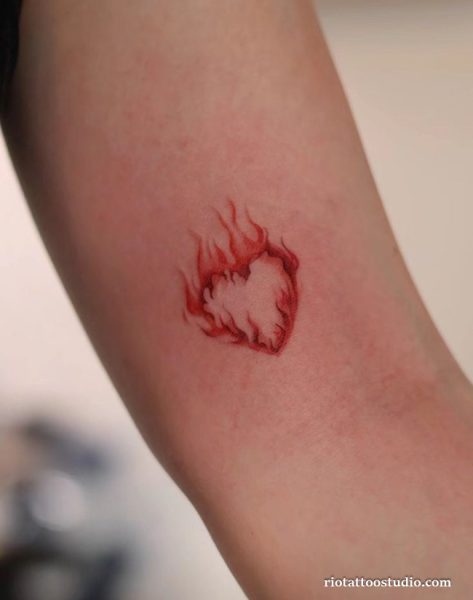 Flaming heart forearm tattoo red fire realistic, passionate heart tattoo