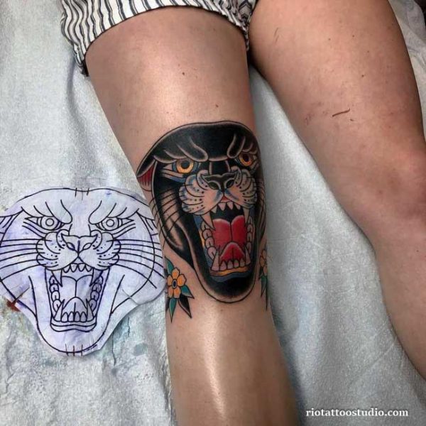 Knee tattoo traditional panther roaring head orange eyes flowers, classic knee tattoo ideas