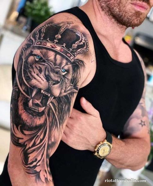 Profile crowned lion blue eyes floral forearm tattoo, artistic lion tattoo