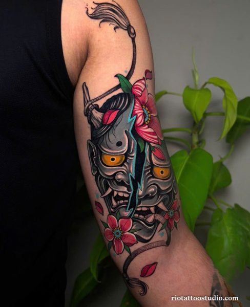Oni mask tattoo colorful pink flowers blue lightning arm, vibrant oni mask tattoo ideas