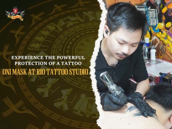 Oni mask tattoo artist inking session Rio Tattoo Studio Hanoi, professional oni mask tattoo