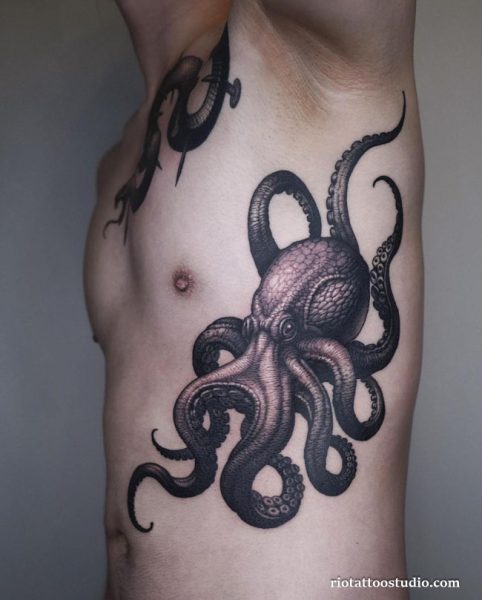 Octopus tattoo realistic black grey tentacles chest side realistic shading, powerful octopus tattoo ideas