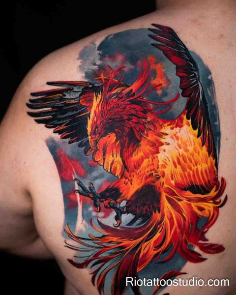 Phoenix tattoo vibrant red orange watercolor shoulder fiery, dynamic phoenix tattoo ideas