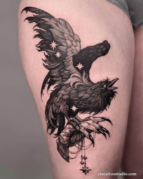 Bold black and white Raven Tattoo on the upper arm at Rio Tattoo Studio.