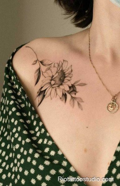 Meaning of shoulder tattoo and the delicate specialty of fineline tattoos.