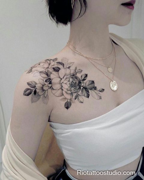 Meaning of shoulder tattoo and the delicate specialty of fineline tattoos.