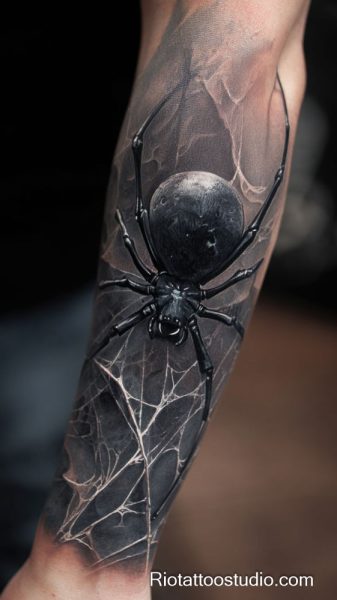 Meaning of spider tattoo and the delicate specialty of fineline tattoos.