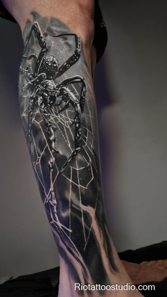 Meaning of spider tattoo and the delicate specialty of fineline tattoos.