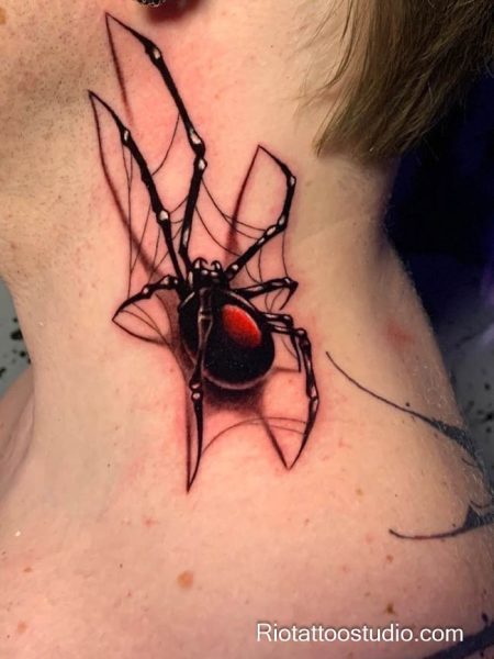 Meaning of spider tattoo and the delicate specialty of fineline tattoos.