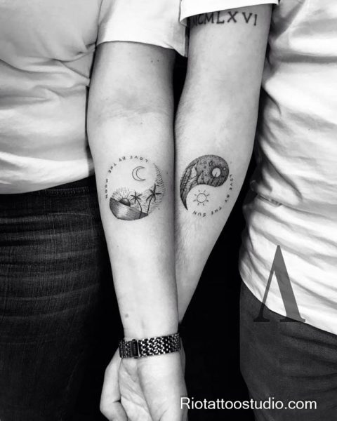 Pair of fine line forearm tattoos: sun with flowing wave spiral rays, crescent moon with intricate tribal patterns. Sun and moon tattoos embody duality, energy flow, and cosmic harmony—perfect for understated couple or individual ink. Sharp black lines at Rio Tattoo Studio, Hanoi.