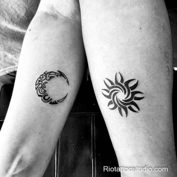 Matching sun and moon tattoo couple forearms patterned crescent swirl sun black ink, symbolic sun and moon tattoo