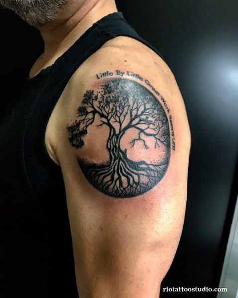 Detailed tree of life tattoo meaning and the delicate specialty of fineline tattoos.