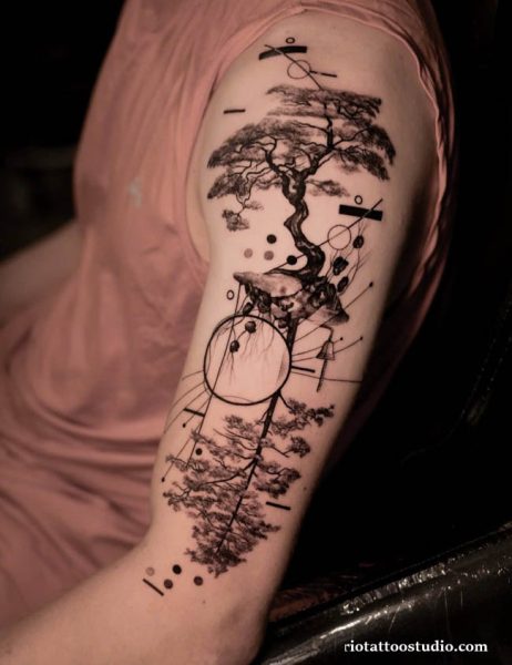 Minimalist geometric tree tattoo with sacred geometry and bonsai elements on upper arm, abstract tree tattoo ideas