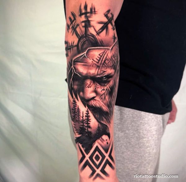 Viking sleeve tattoo realistic bear sword cracked face arm, intense viking tattoo
