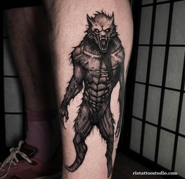Werewolf tattoo upright beast muscular thigh leg blackwork snarling, powerful werewolf tattoo