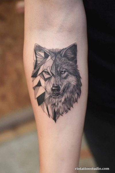 Geometric wolf head facets forearm tattoo abstract, modern wolf tattoo