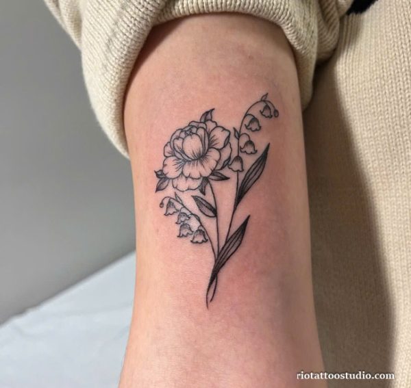 Fine line birth flower tattoo with peony and lily of the valley on upper arm, elegant birth flower tattoo ideas