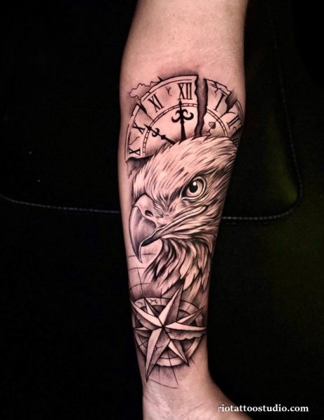 Realistic compass tattoo with bald eagle and broken clock on upper arm, symbolic compass tattoo ideas