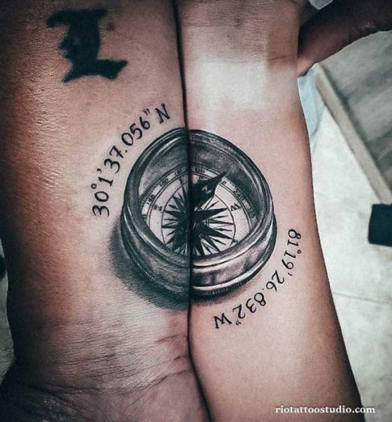 Matching dad daughter tattoos with split compass and coordinates on wrists