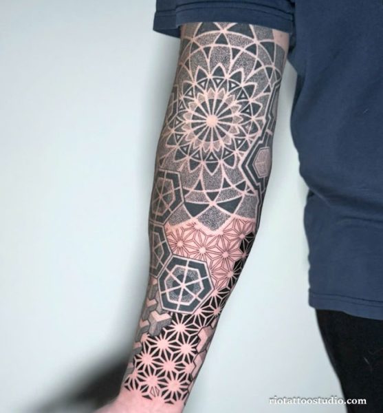 Full geometric half sleeve tattoo with intricate mandalas, sacred geometry and hexagons on arm