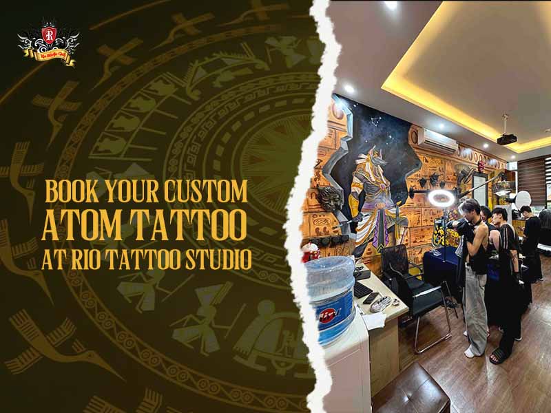 Professional artist and client with a finished atom tattoo at Rio Studio.