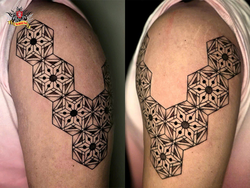 Minimal geometric simple tattoos for men on bicep.