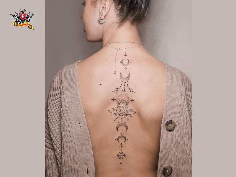 Floral moon phase tattoo for growth symbolism.