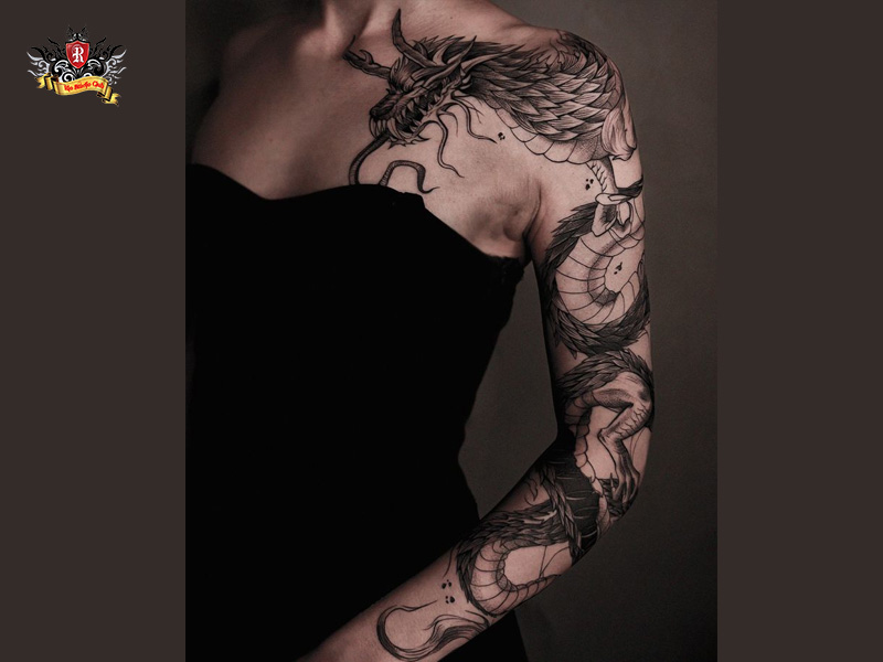 Full back and chest Chinese dragon tattoo in traditional sprawling style at Rio Tattoo Studio.