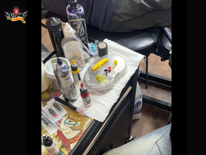 Tattoo ink and sterile medical tray setup for safe face tattoos for women at Rio Tattoo Studio.
