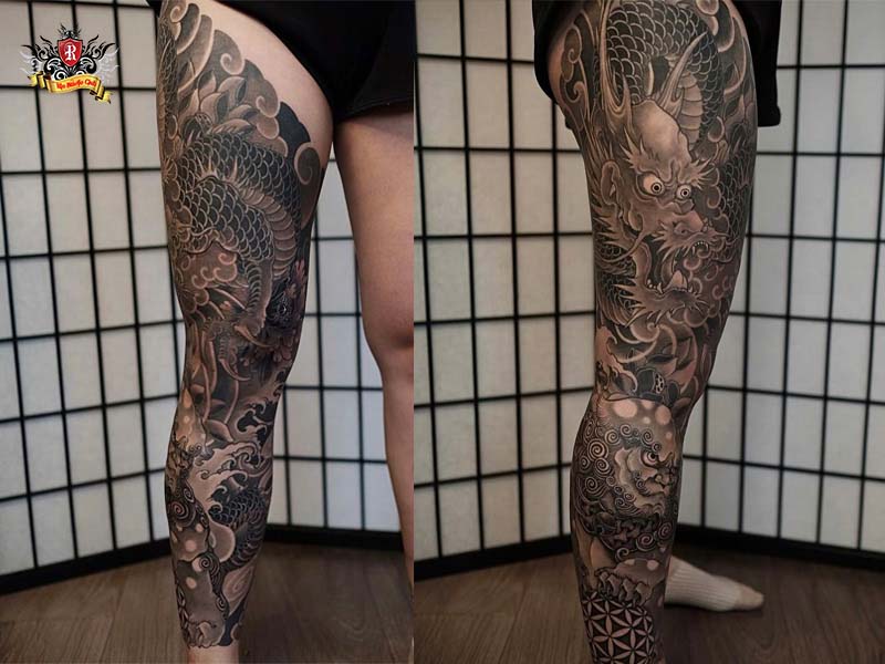 Powerful foo dragon tattoo wrapping along a male client's calf and thigh placement at Rio Tattoo Studio.